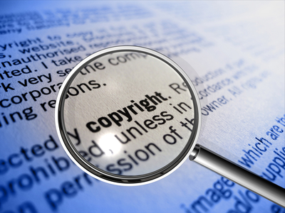 copyright with magnifier